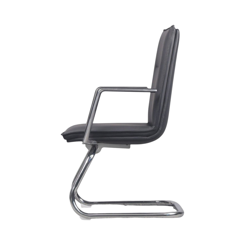 Xiaoyaozuo office chair black faux leather executive chair with polished chrome cantilever base and armrests.