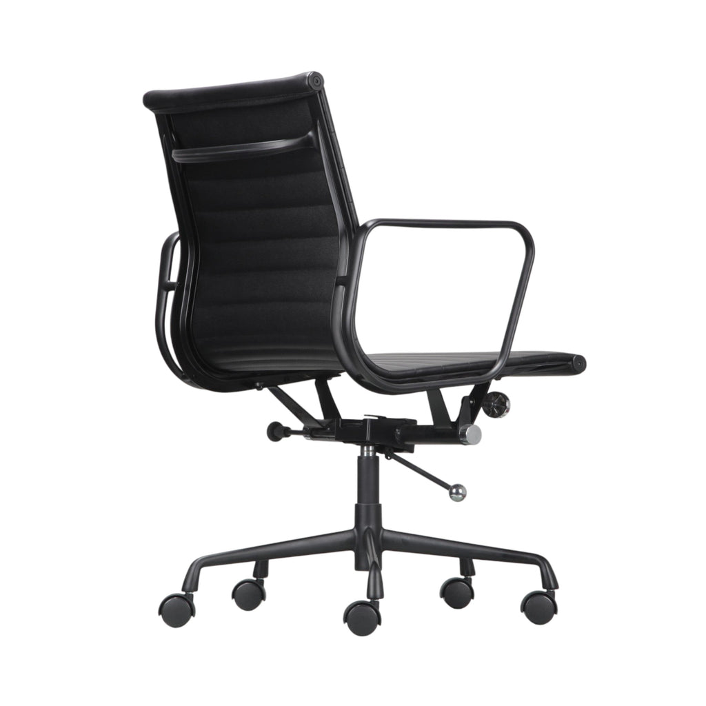 Xiaoyaozuo office chair black faux leather executive chair with armrests and horizontal stitching on backrest.