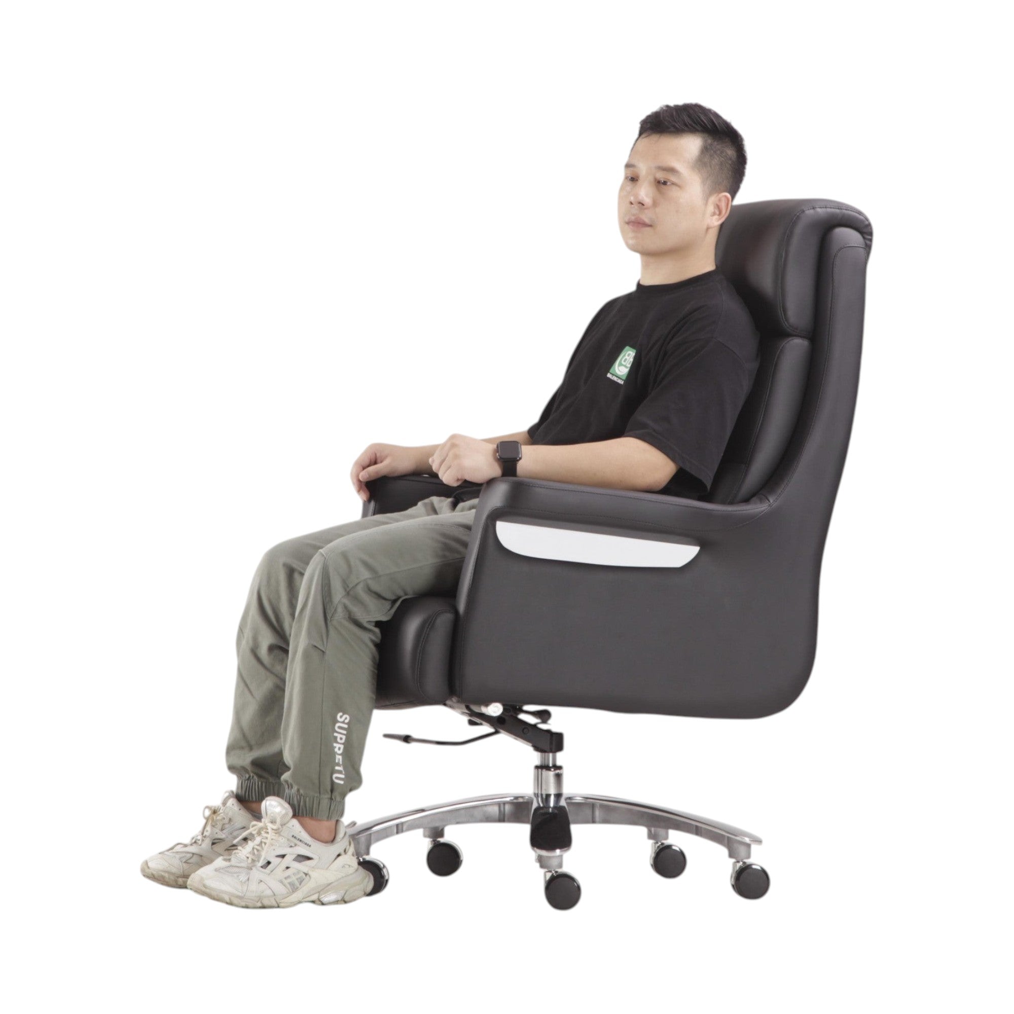 Xiaoyaozuo office chair: Black faux leather executive chair with high back, plush cushioning, and chrome accents. Ergonomic design with adjustable height and casters.