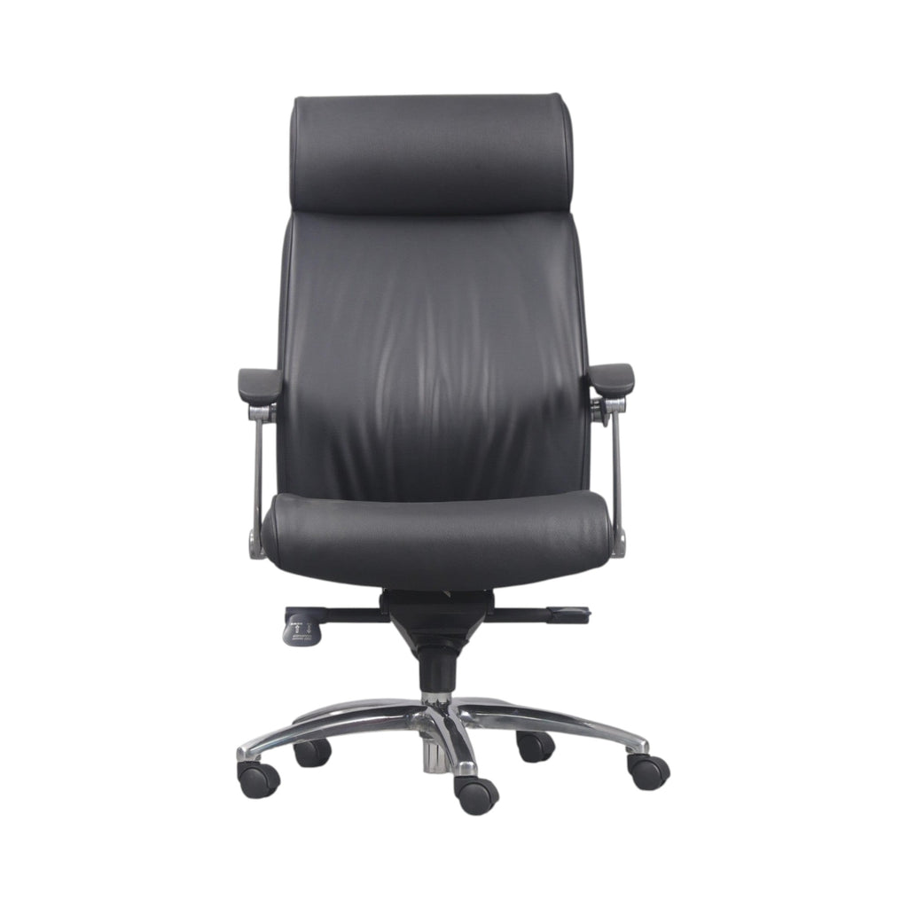 Xiaoyaozuo office chair: Black faux leather executive chair with high back, headrest, and polished chrome base with casters.