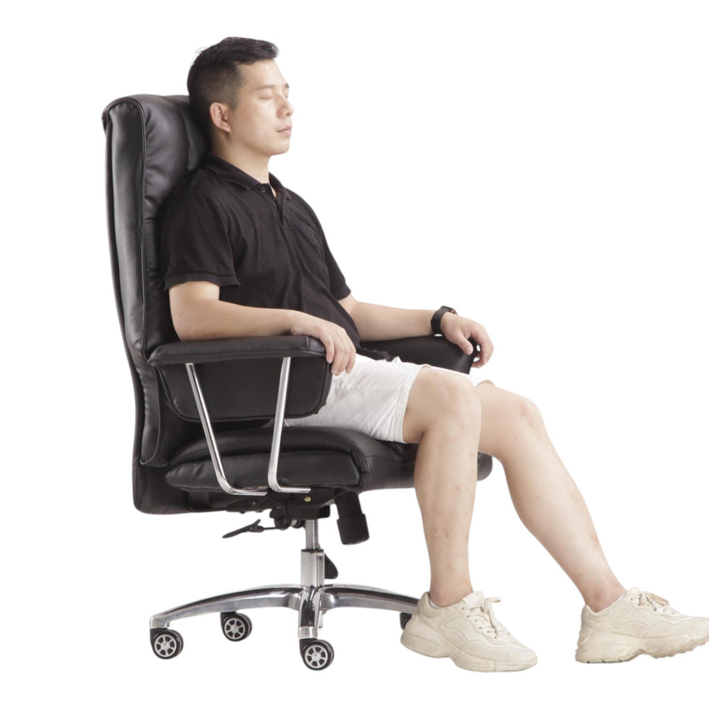 Xiaoyaozuo office chair executive high back chair in black faux leather with plush cushioning and chrome base.
