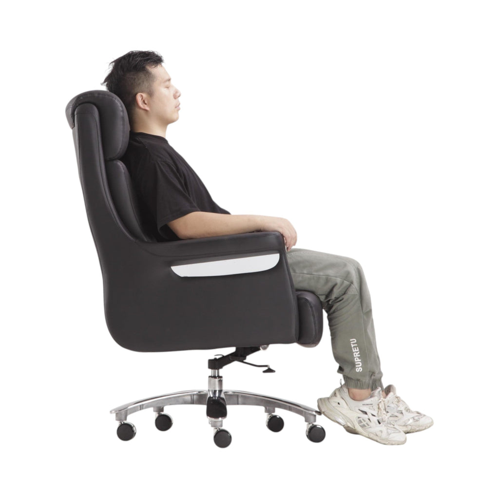 Xiaoyaozuo office chair black faux leather executive chair with high backrest and chrome accents, shown with a man seated.