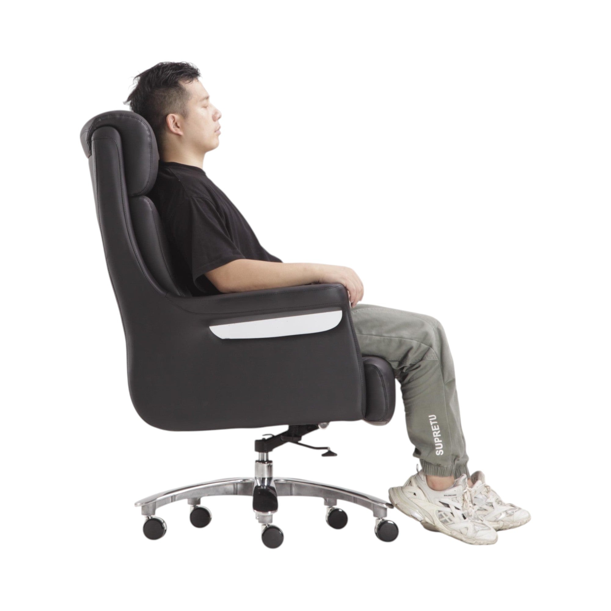 Xiaoyaozuo office chair black faux leather executive chair with high backrest and chrome accents, shown with a man seated.