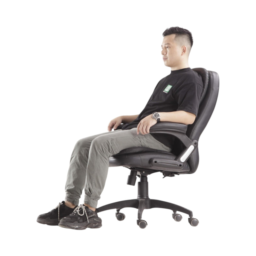 Xiaoyaozuo office chair black faux leather executive high back chair with adjustable height and casters, model seated.