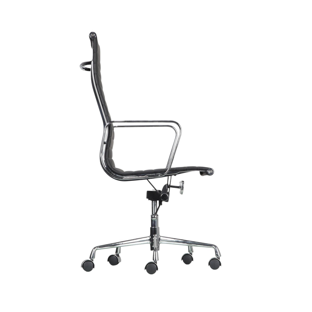 Xiaoyaozuo office chair black faux leather executive high back chair with polished chrome frame and ribbed cushioning.