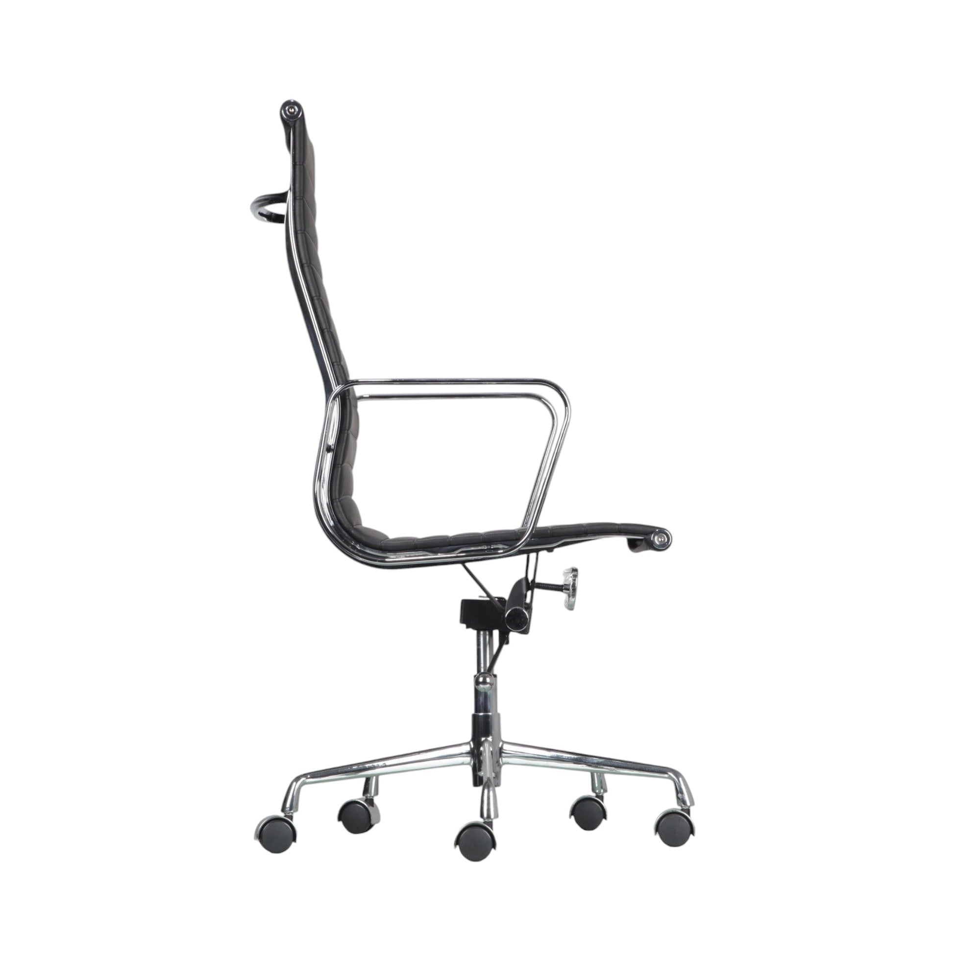 Xiaoyaozuo office chair black faux leather executive high back chair with polished chrome frame and ribbed cushioning.