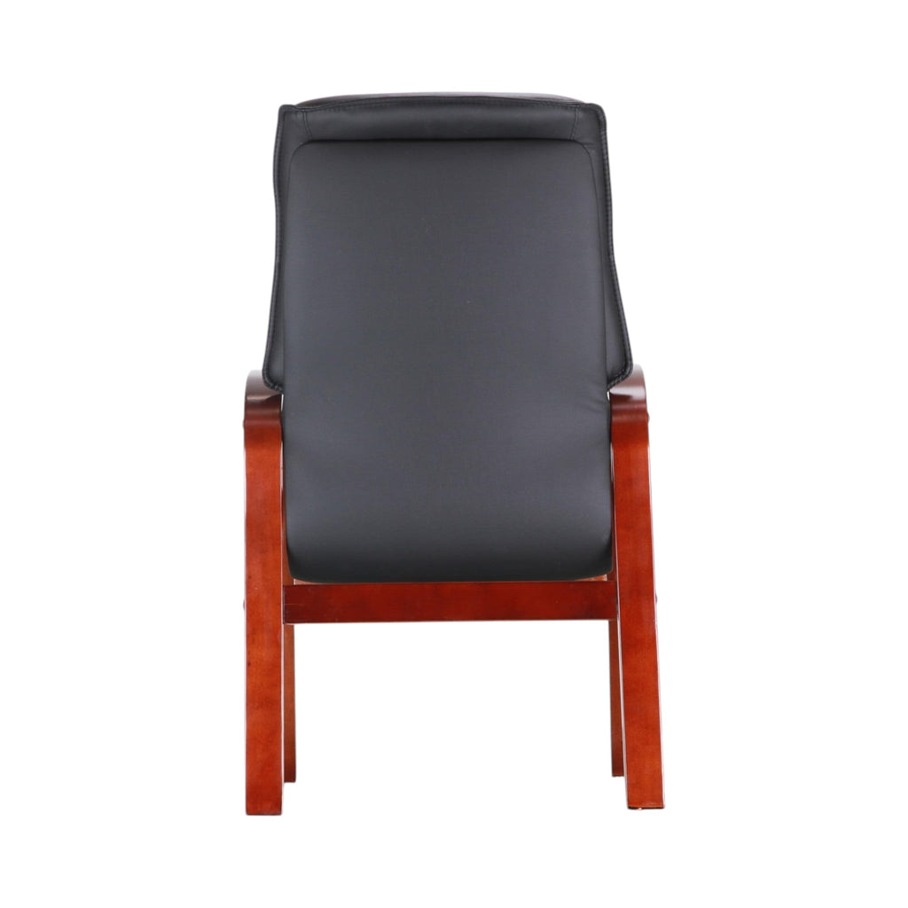 Xiaoyaozuo office chair: Black faux leather executive chair with a high back and warm-toned wooden frame and armrests.