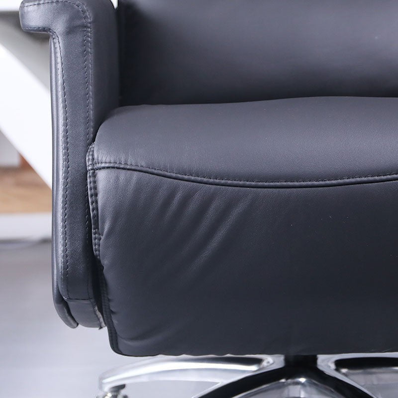 Xiaoyaozuo office chair A227 black leather executive chair with padded armrests and lumbar support.