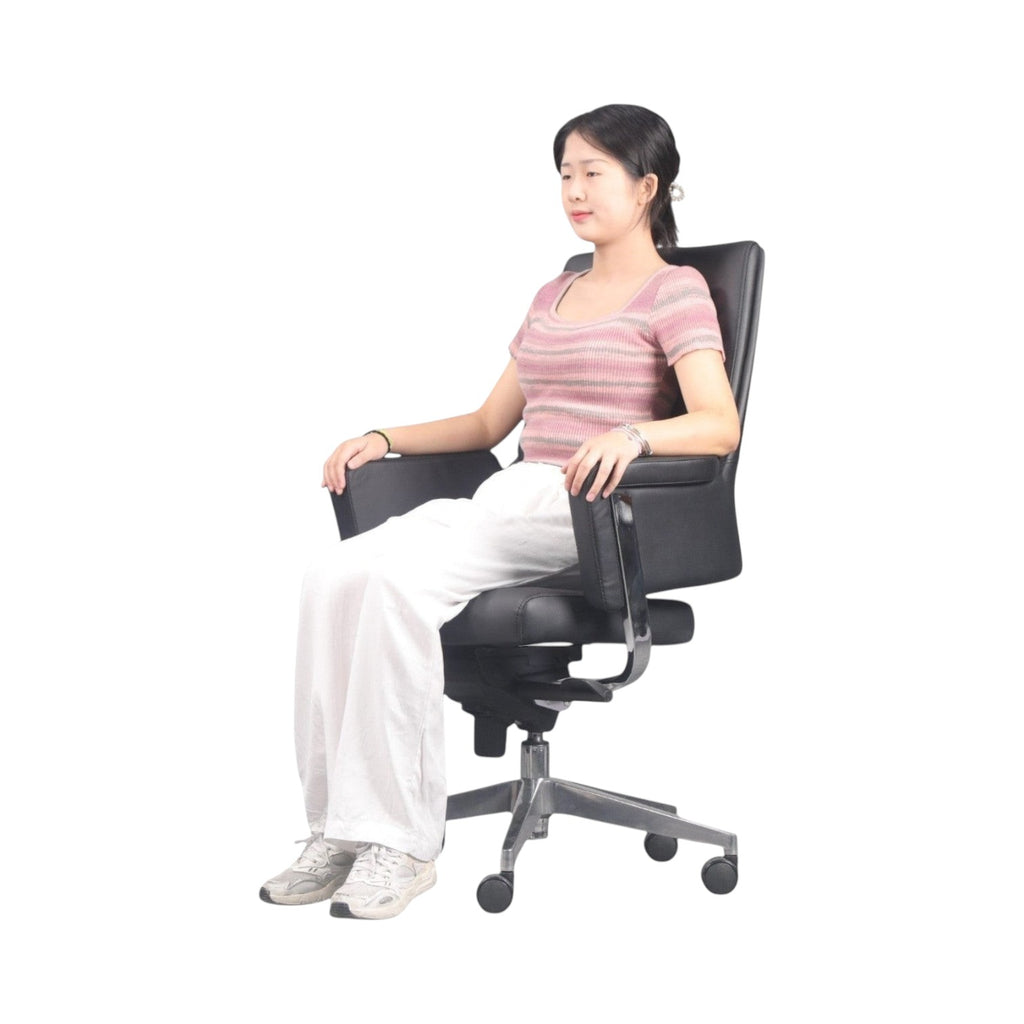 Xiaoyaozuo office chair black leather executive chair with ergonomic design and adjustable height, shown with a woman seated.