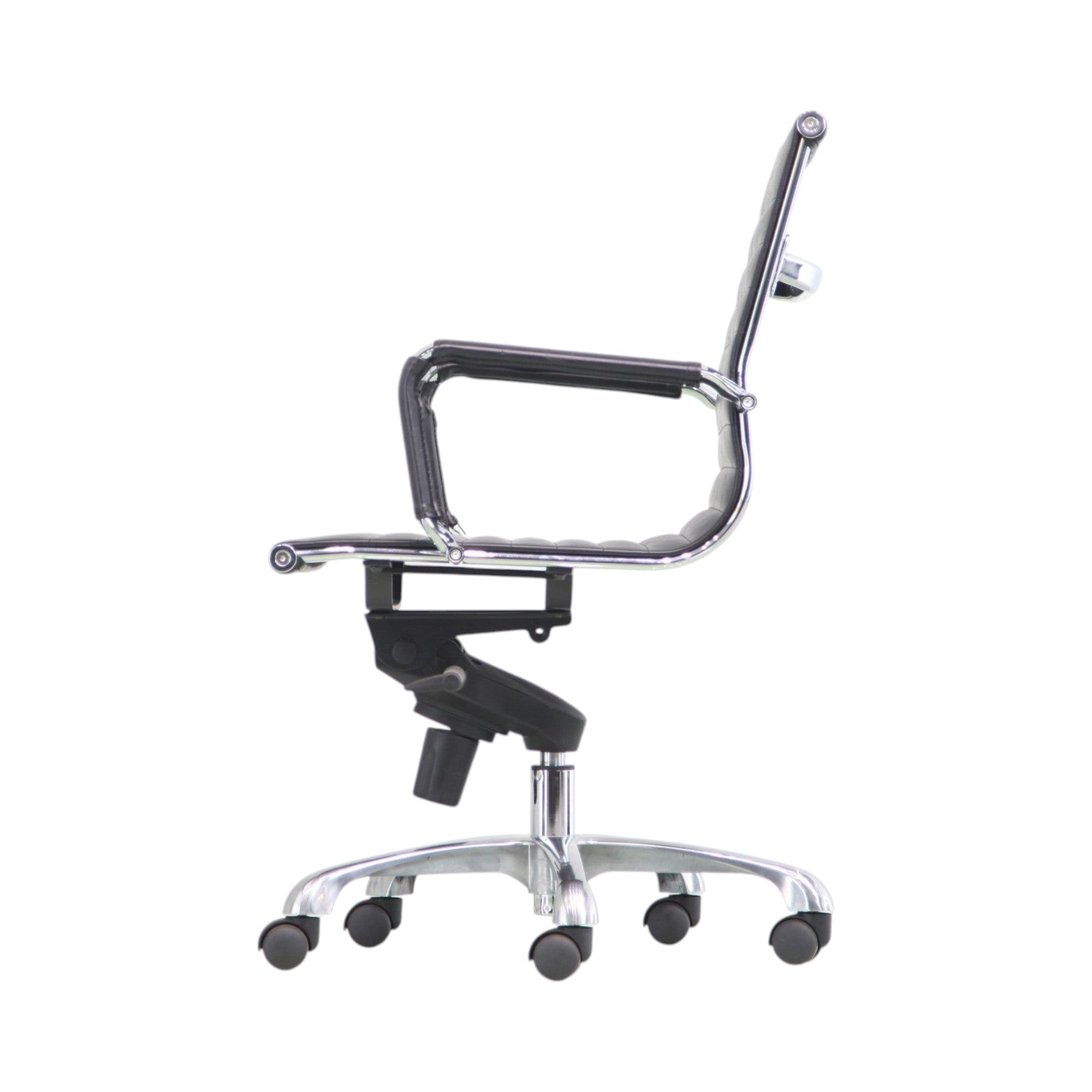 Xiaoyaozuo office chair black leather ribbed executive swivel chair with polished aluminum frame and casters.