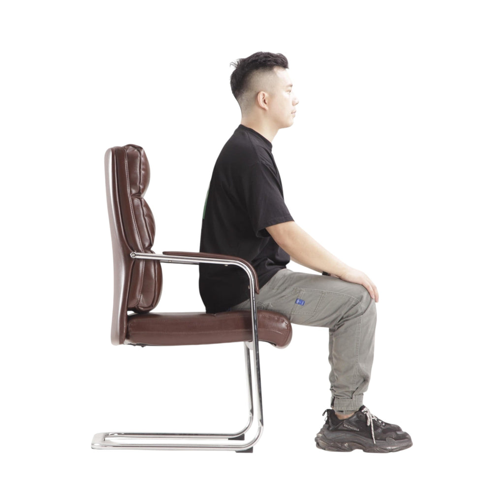 Xiaoyaozuo office chair: Executive brown faux leather chair with padded seat and chrome cantilever frame, featuring a high back for comfort.