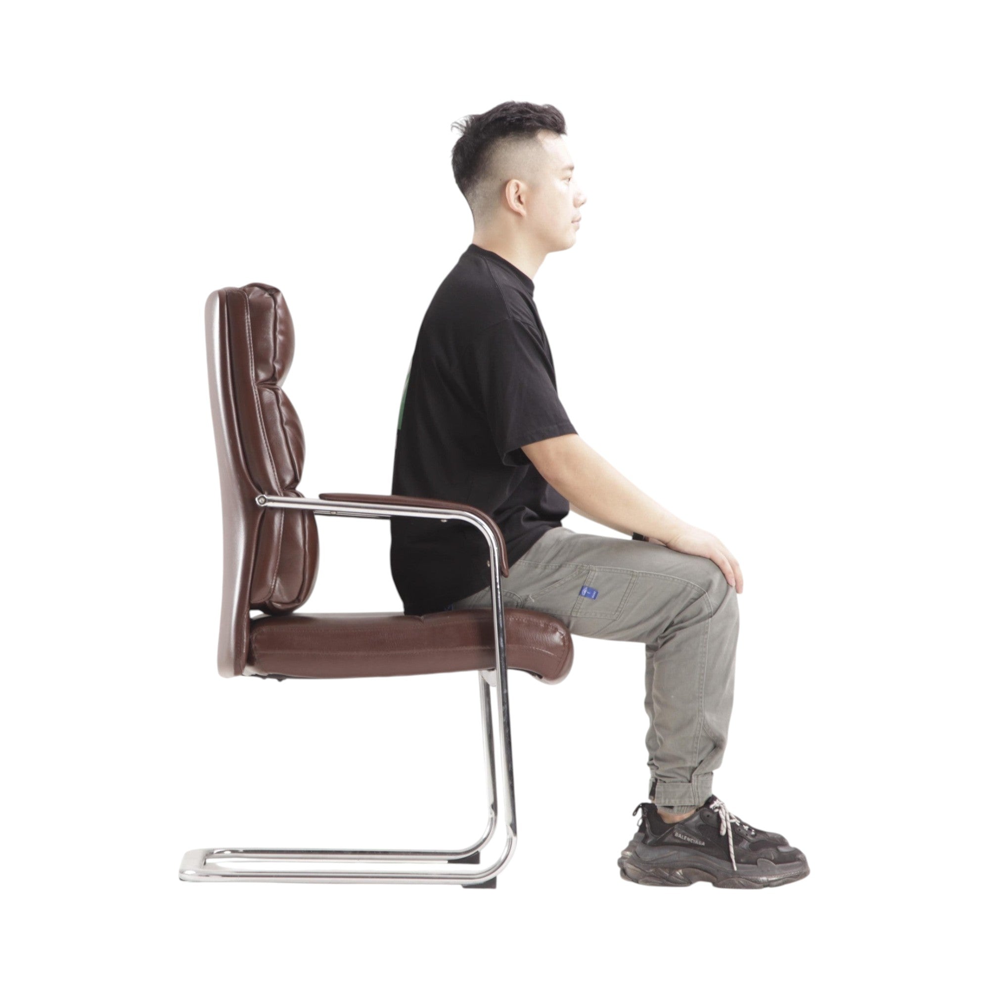 Xiaoyaozuo office chair: Executive brown faux leather chair with padded seat and chrome cantilever frame, featuring a high back for comfort.