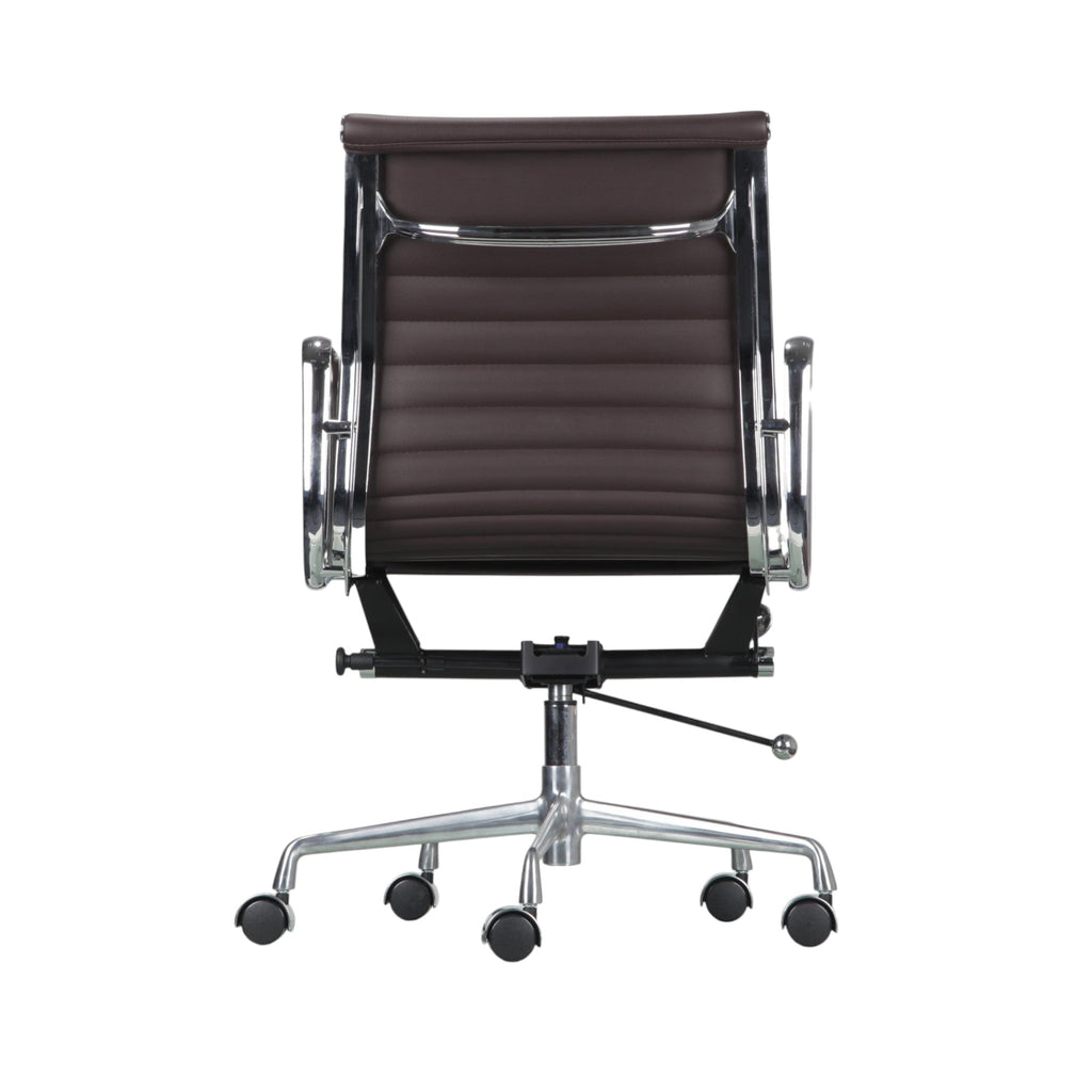 Xiaoyaozuo office chair executive chair in brown faux leather with chrome accents and horizontal stitching. Ergonomic design with armrests and casters.