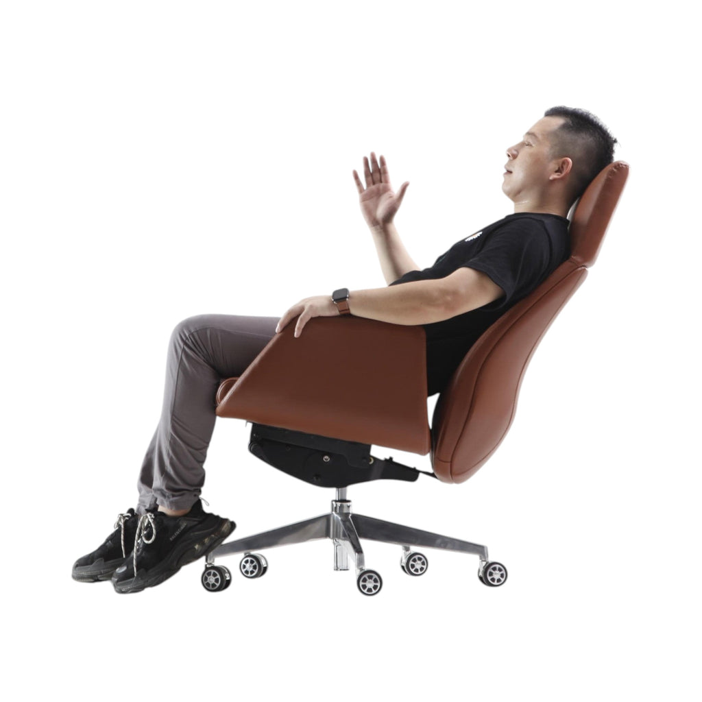 Xiaoyaozuo office chair executive high back chair in brown faux leather with polished metal base and casters, shown with a man sitting.