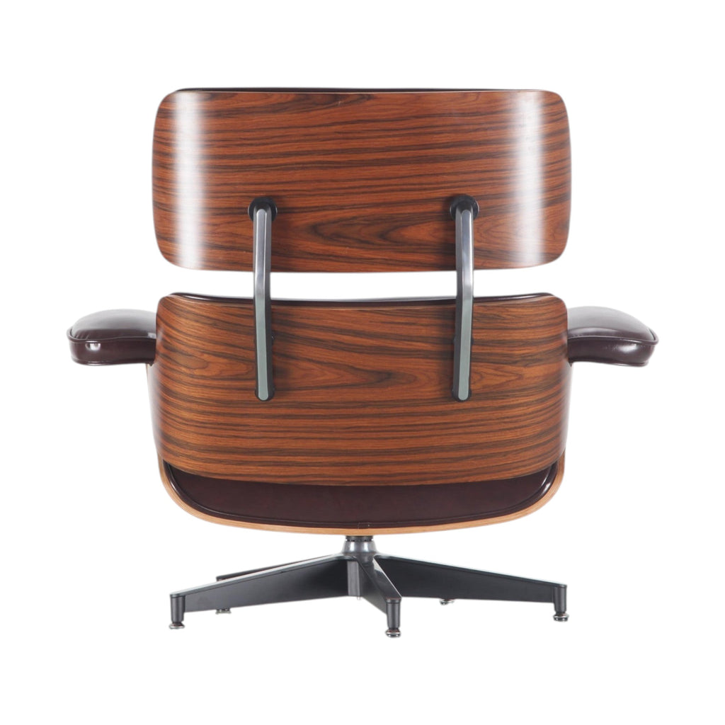 Xiaoyaozuo office chair brown leather executive lounge chair with wood veneer shell and swivel base.
