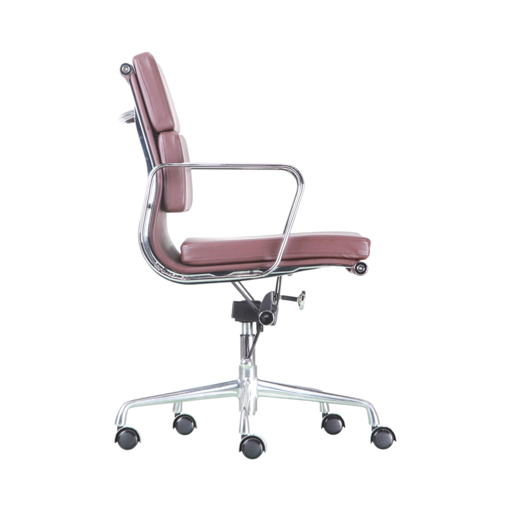 Xiaoyaozuo office chair executive chair in burgundy faux leather with polished chrome frame and casters.