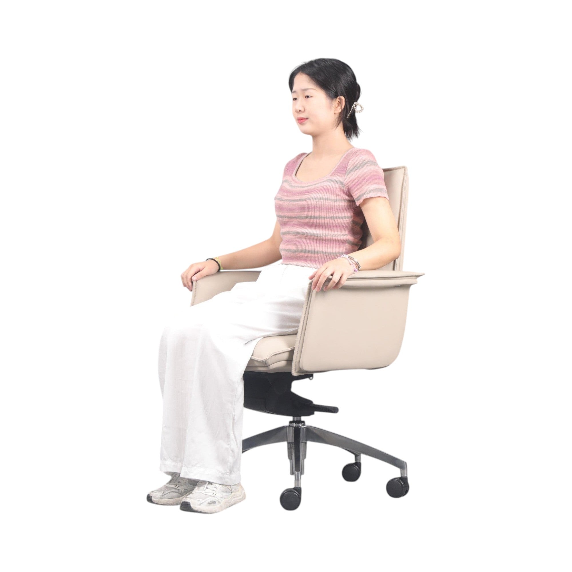 Xiaoyaozuo office chair in cream faux leather with ergonomic cushioning and armrests, featuring smooth-rolling casters and adjustable height.