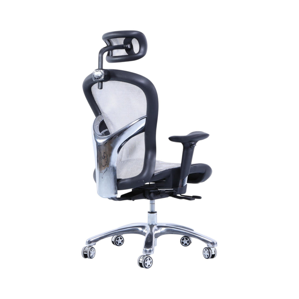 Xiaoyaozuo office chair: Ergonomic black mesh office chair with adjustable headrest and lumbar support, on chrome base with casters.
