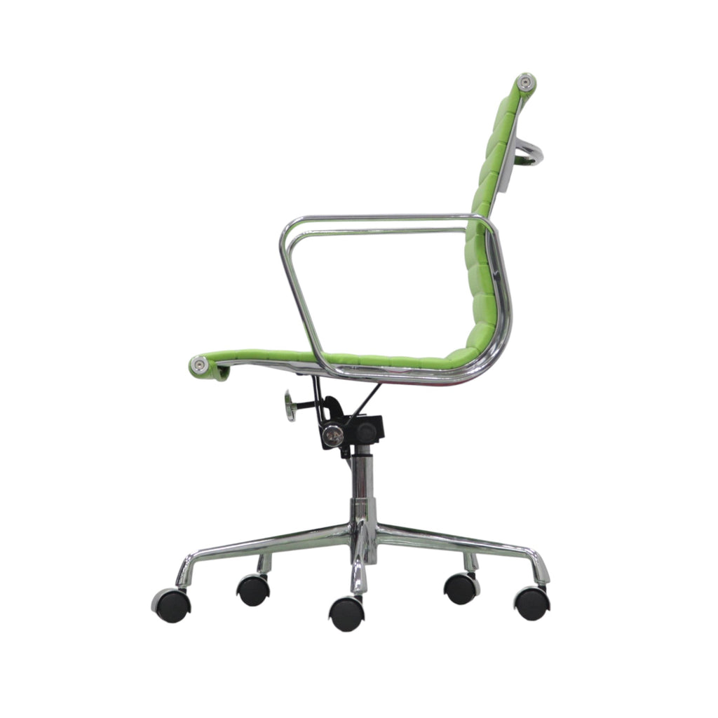 Xiaoyaozuo office chair, modern green faux leather executive chair with chrome armrests and base, ergonomic design with horizontal stitching, on casters.