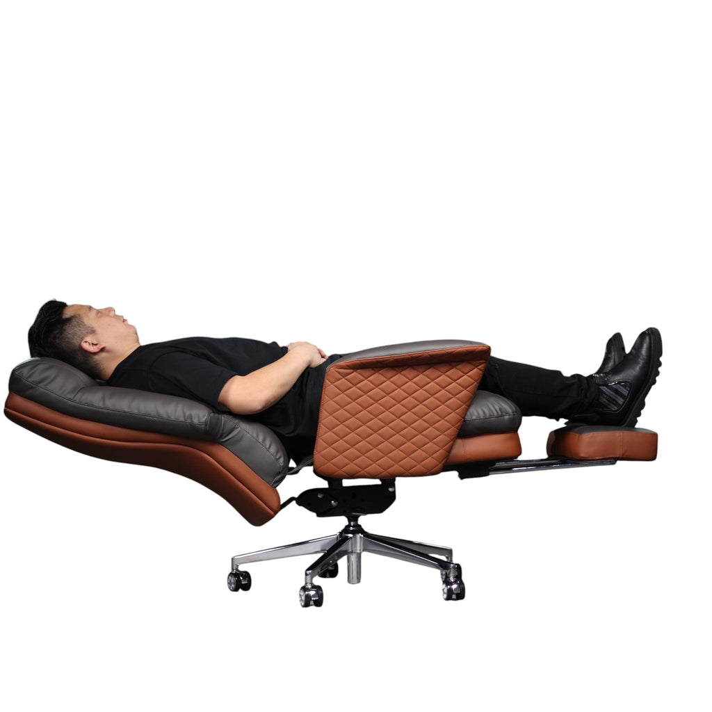 Xiaoyaozuo office chair grey and brown faux leather executive chair with diamond-stitched armrests and integrated footrest, man relaxing.
