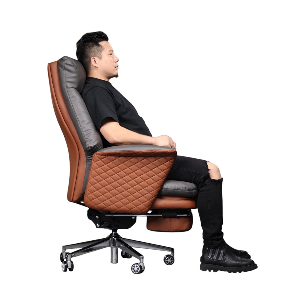 Xiaoyaozuo office chair grey and brown faux leather executive chair with diamond-stitched armrests and integrated footrest.
