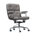 Xiaoyaozuo office chair executive management chair in grey faux leather with tufted back and chrome accents, ergonomic design, and casters.