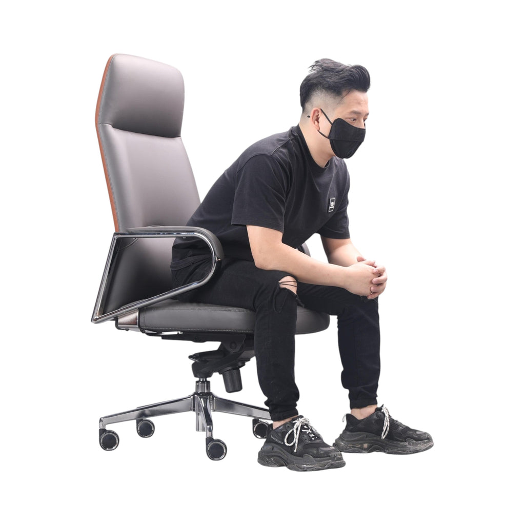 Xiaoyaozuo office chair executive high back chair in grey faux leather with orange trim, chrome accents and casters.