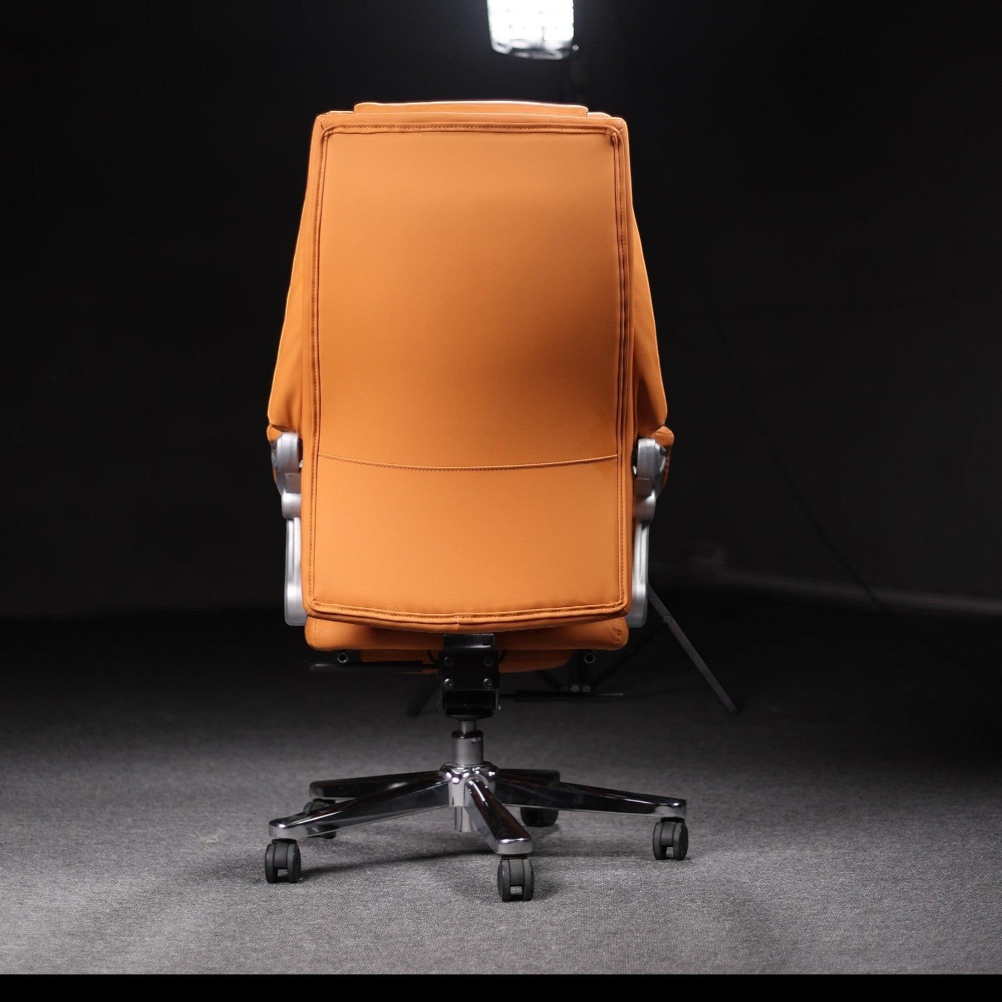 Xiaoyaozuo office chair executive PU leather orange ergonomic chair with footrest and casters