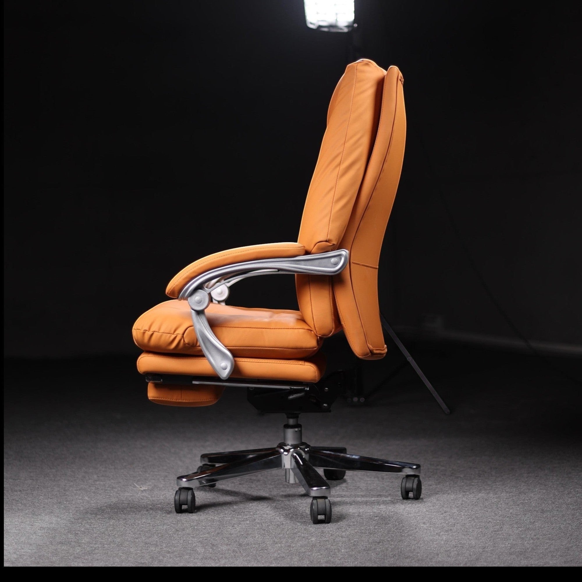 Xiaoyaozuo office chair executive orange PU leather ergonomic chair with footrest and casters