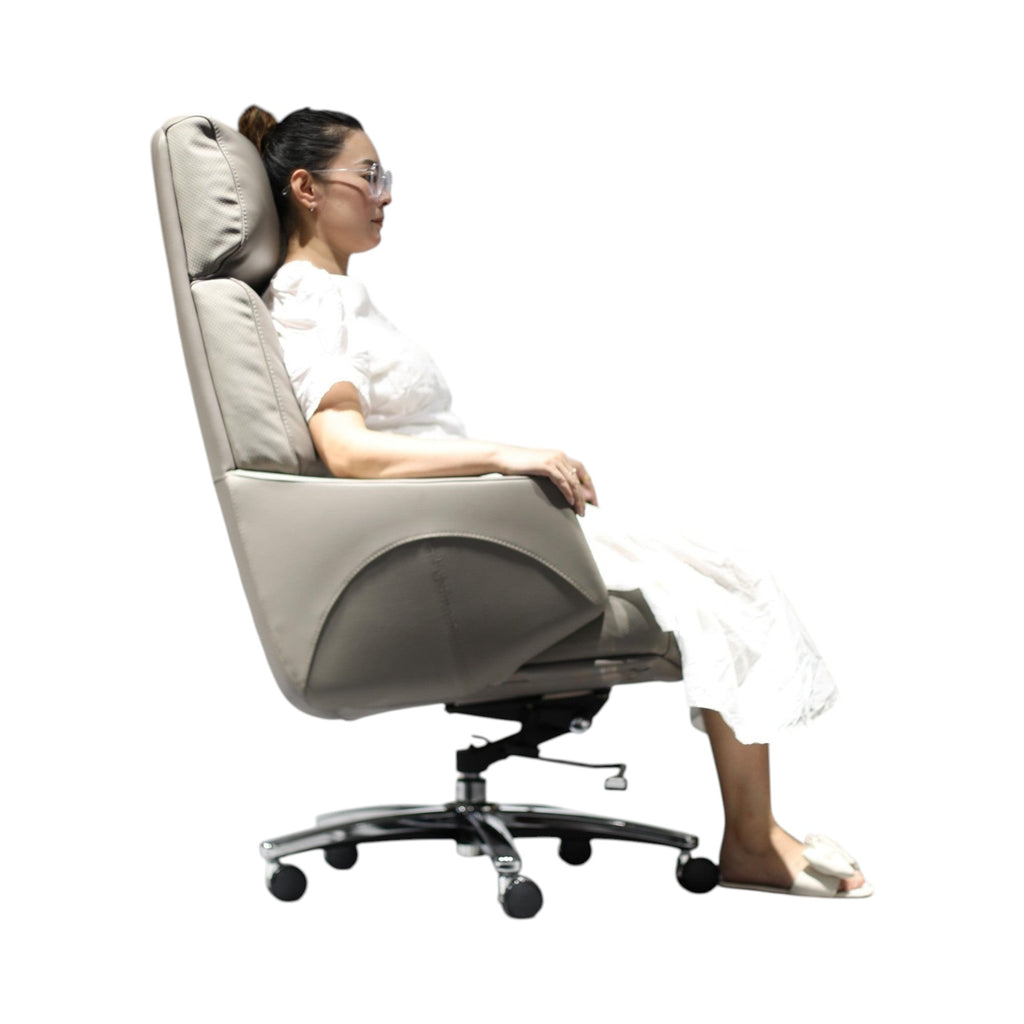 Xiaoyaozuo office chair taupe leather executive high back chair with ergonomic design and adjustable settings.