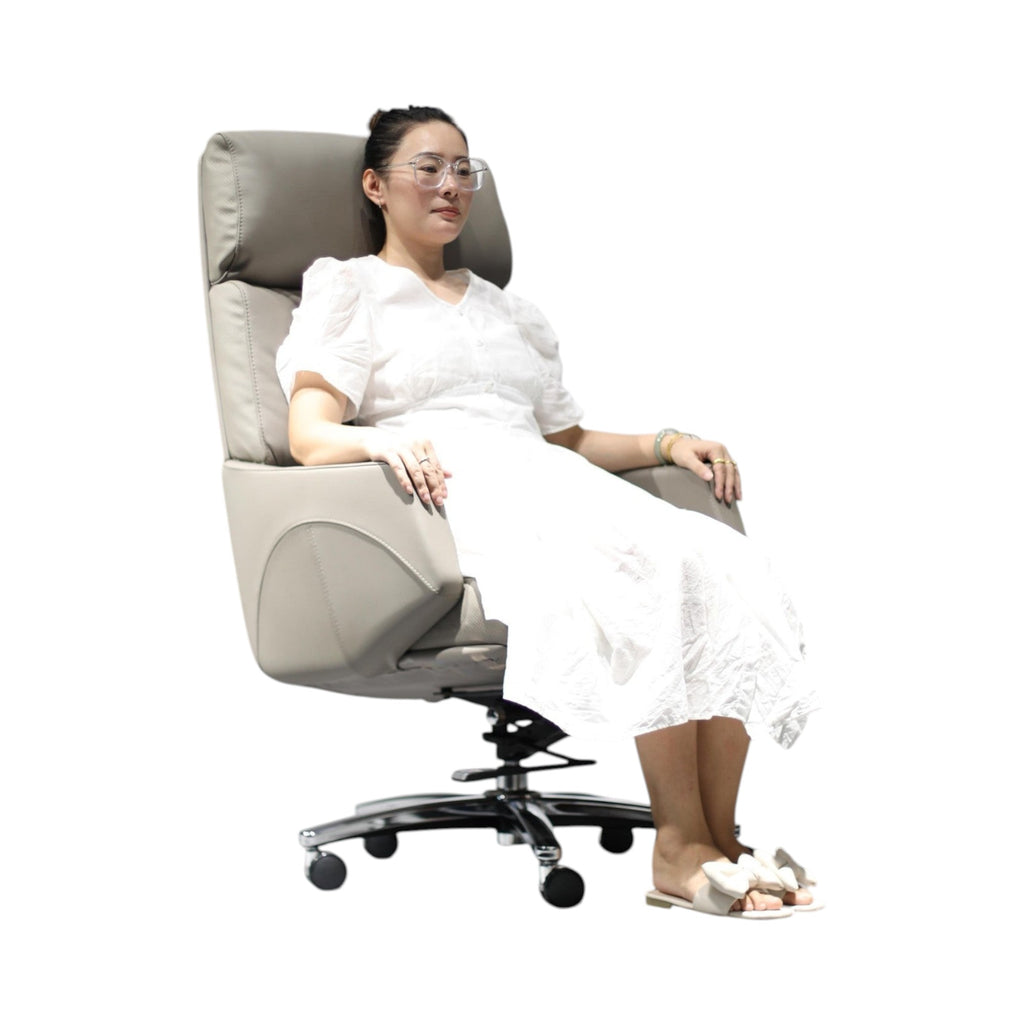 Xiaoyaozuo office chair taupe leather executive high back chair with ergonomic design and adjustable settings.