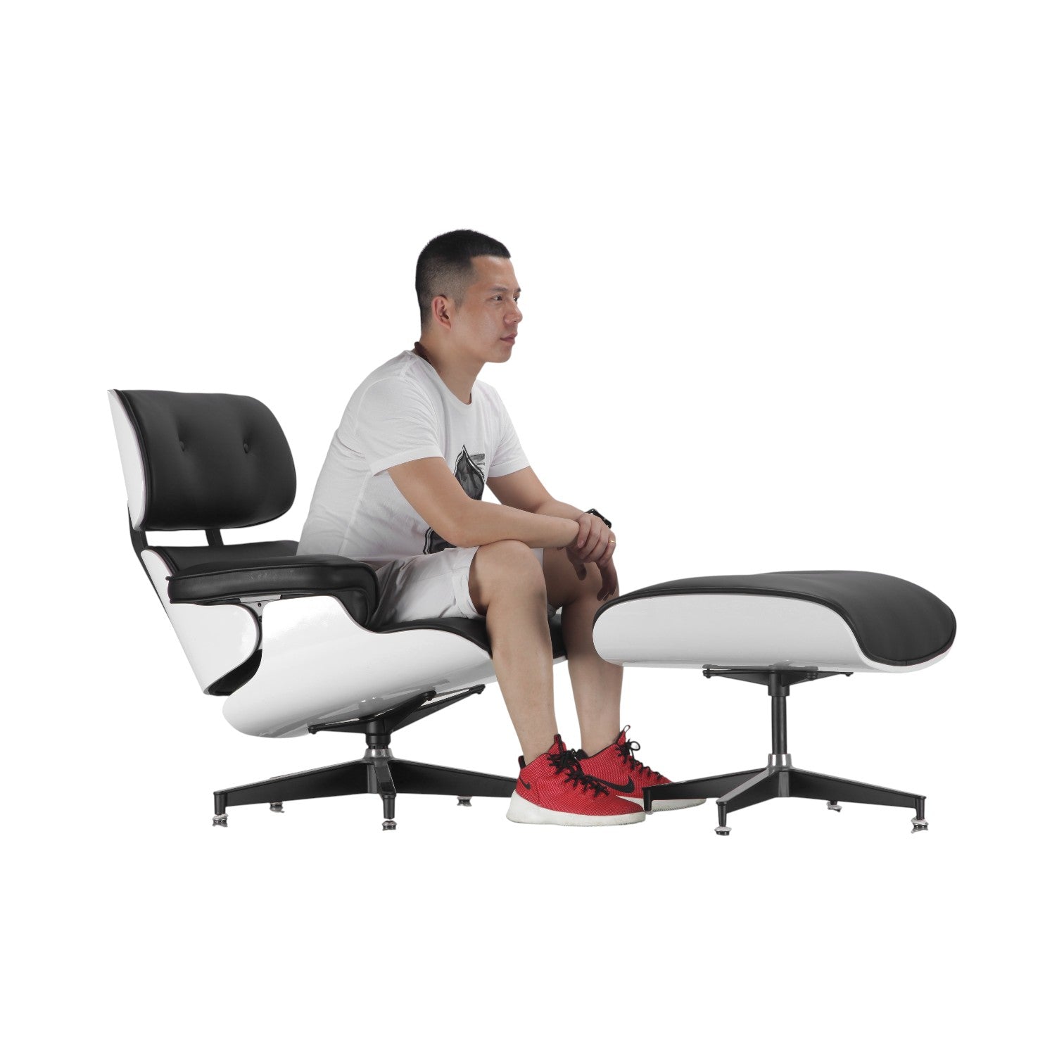 Xiaoyaozuo office chair: Modern white shell lounge chair with black leather upholstery and swivel base, shown with matching ottoman.