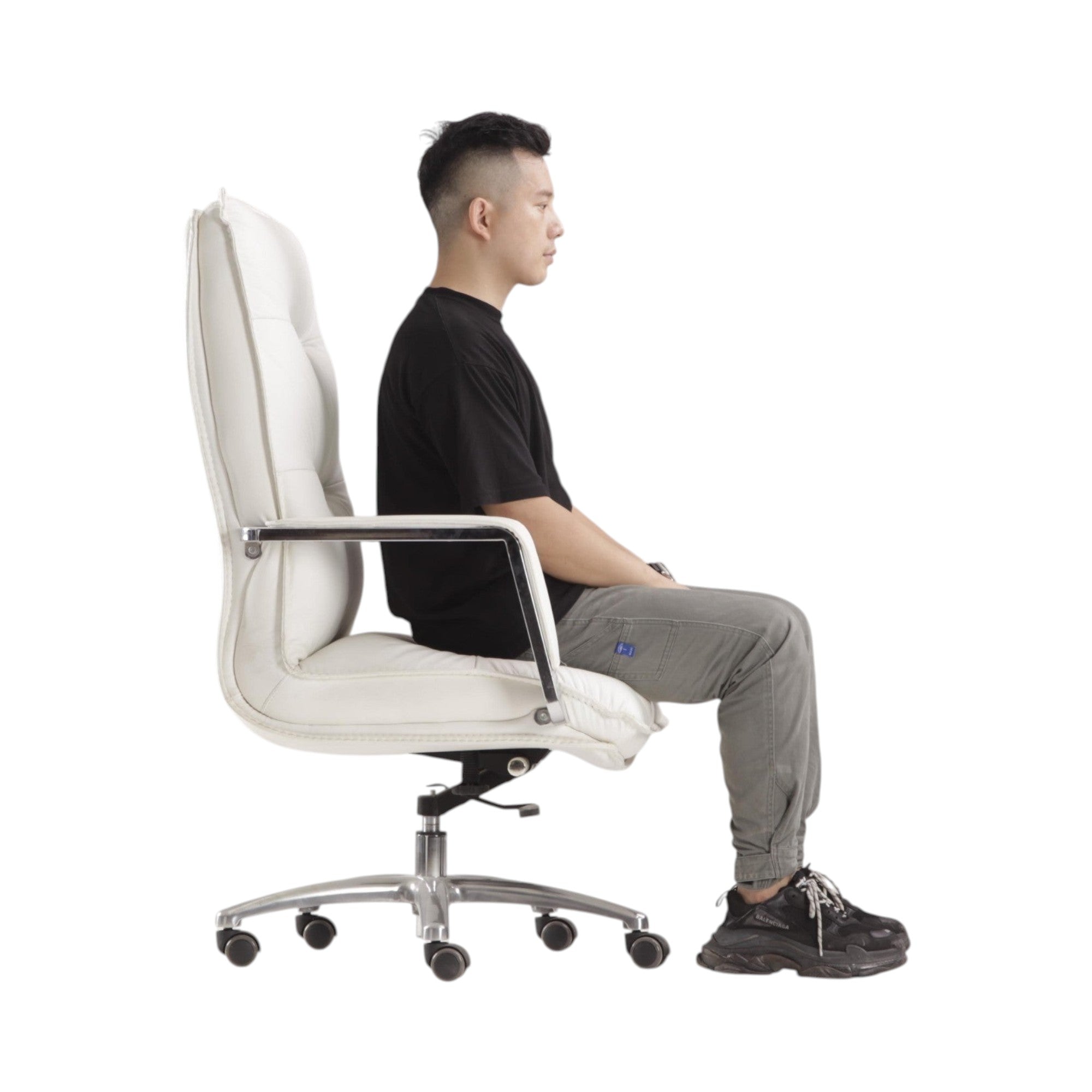 Xiaoyaozuo office chair executive high back chair in white faux leather with chrome accents and aluminum base, shown with a man sitting.