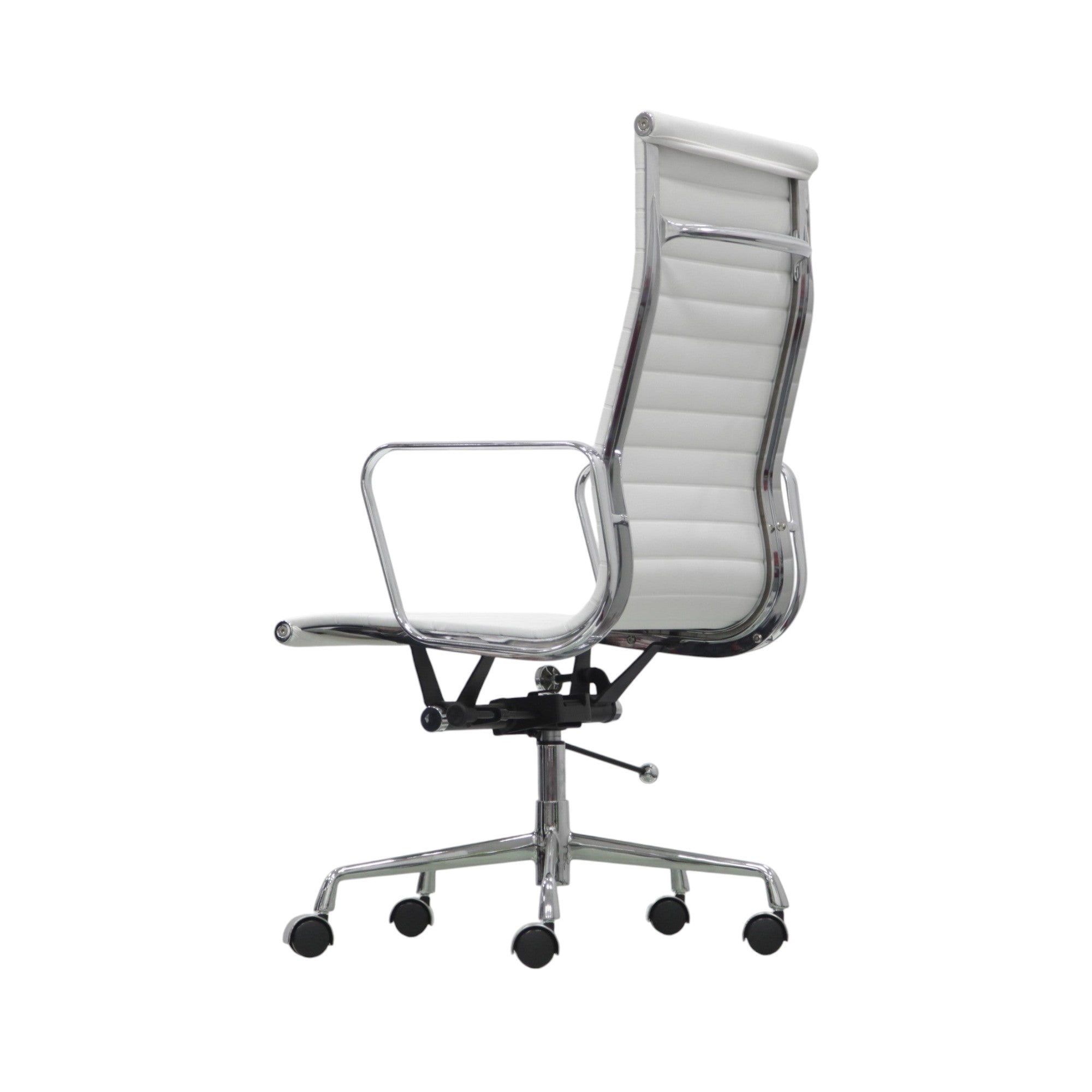 Xiaoyaozuo office chair: White faux leather executive chair with ribbed high back and polished chrome frame, adjustable height, and casters.